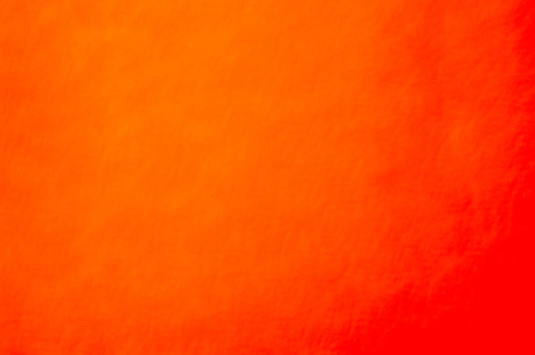 Red orange textured wall. Abstract gradient background.